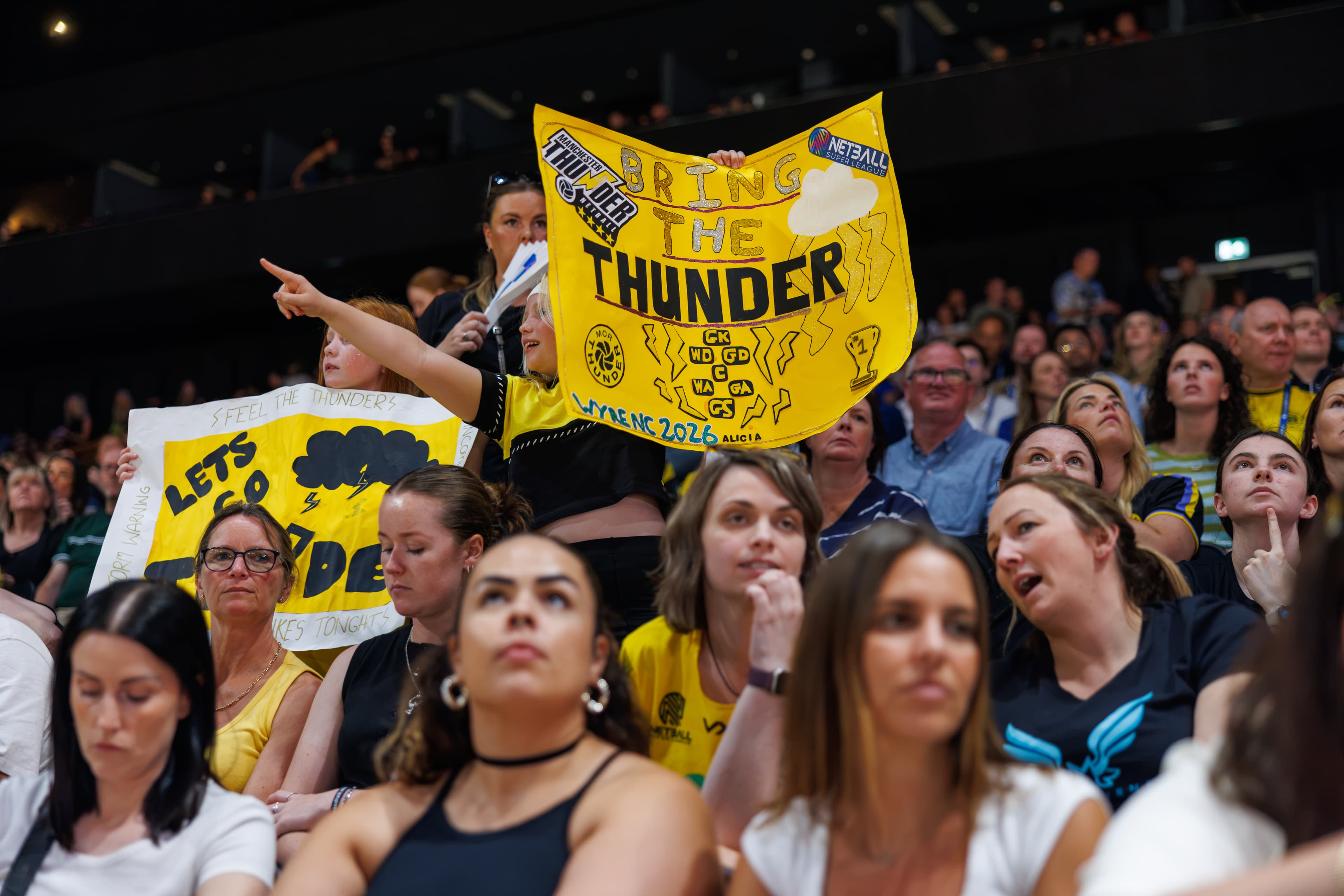 Manchester Thunder supporters holding a flag during the 2026 Netball Super League Final.