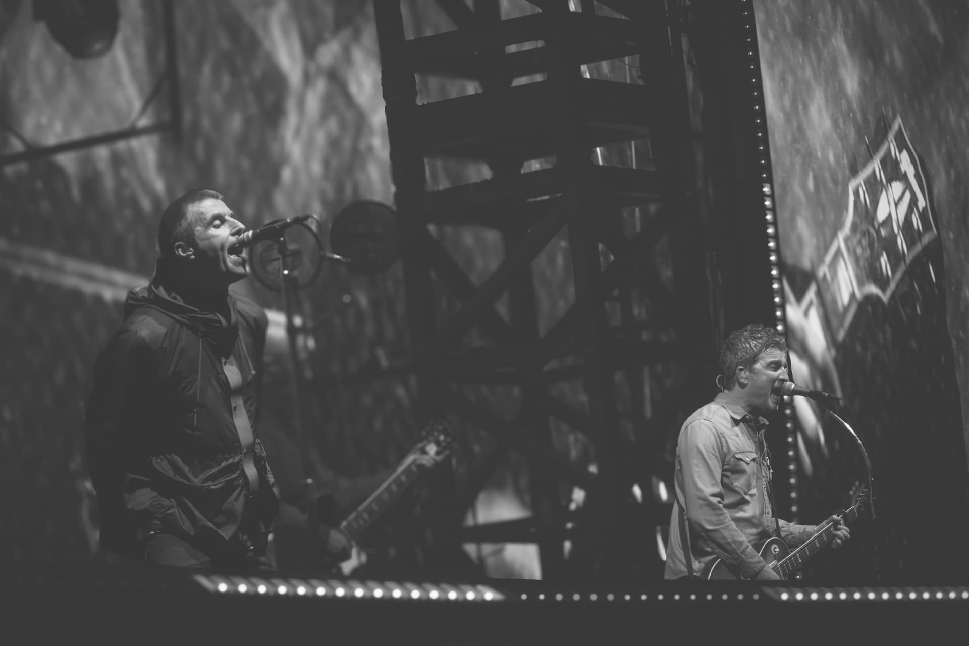 Oasis performing live in Cardiff on the opening night of their reunion.