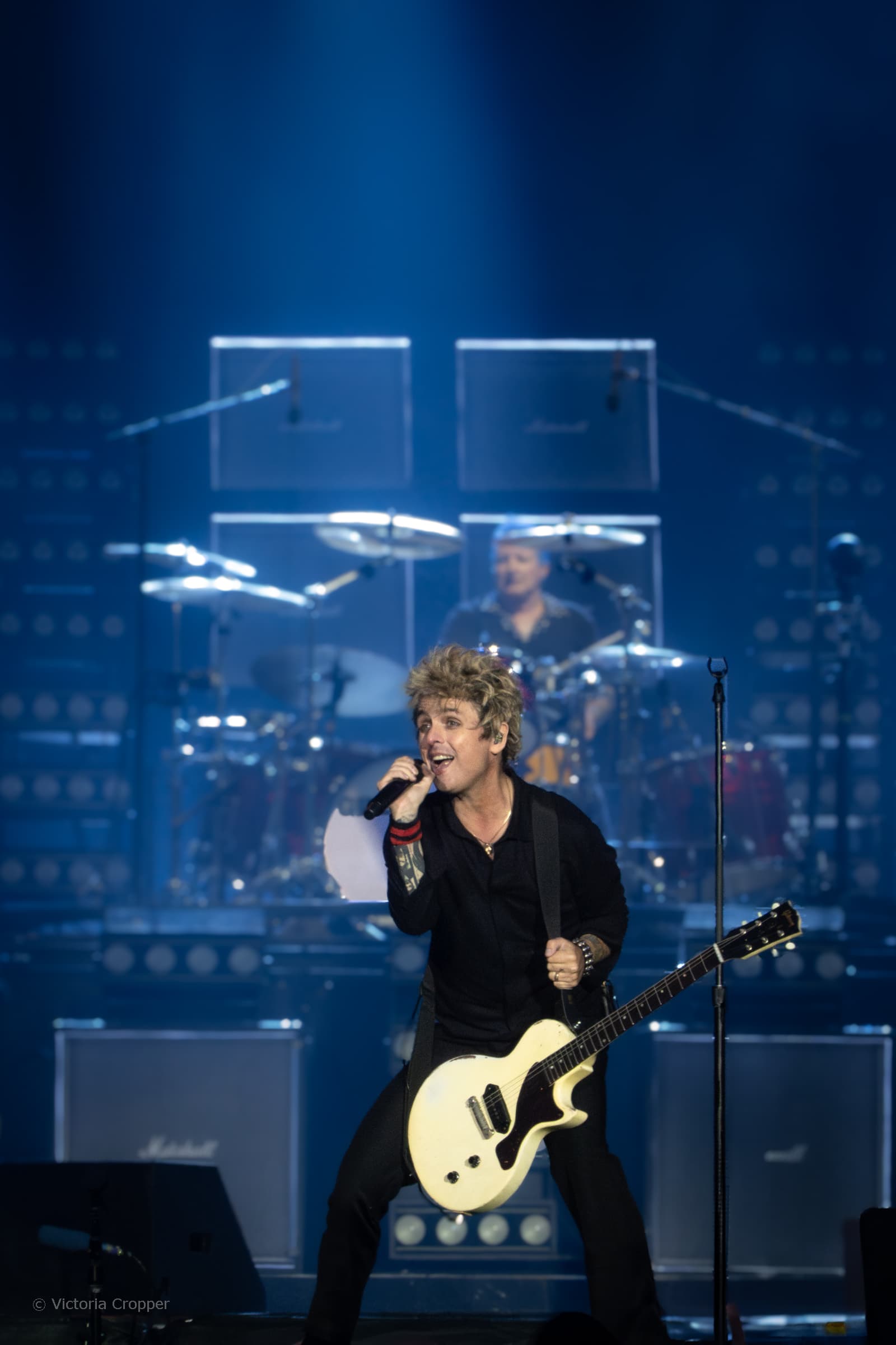 Green Day performing live at Old Trafford Cricket Ground in Manchester.