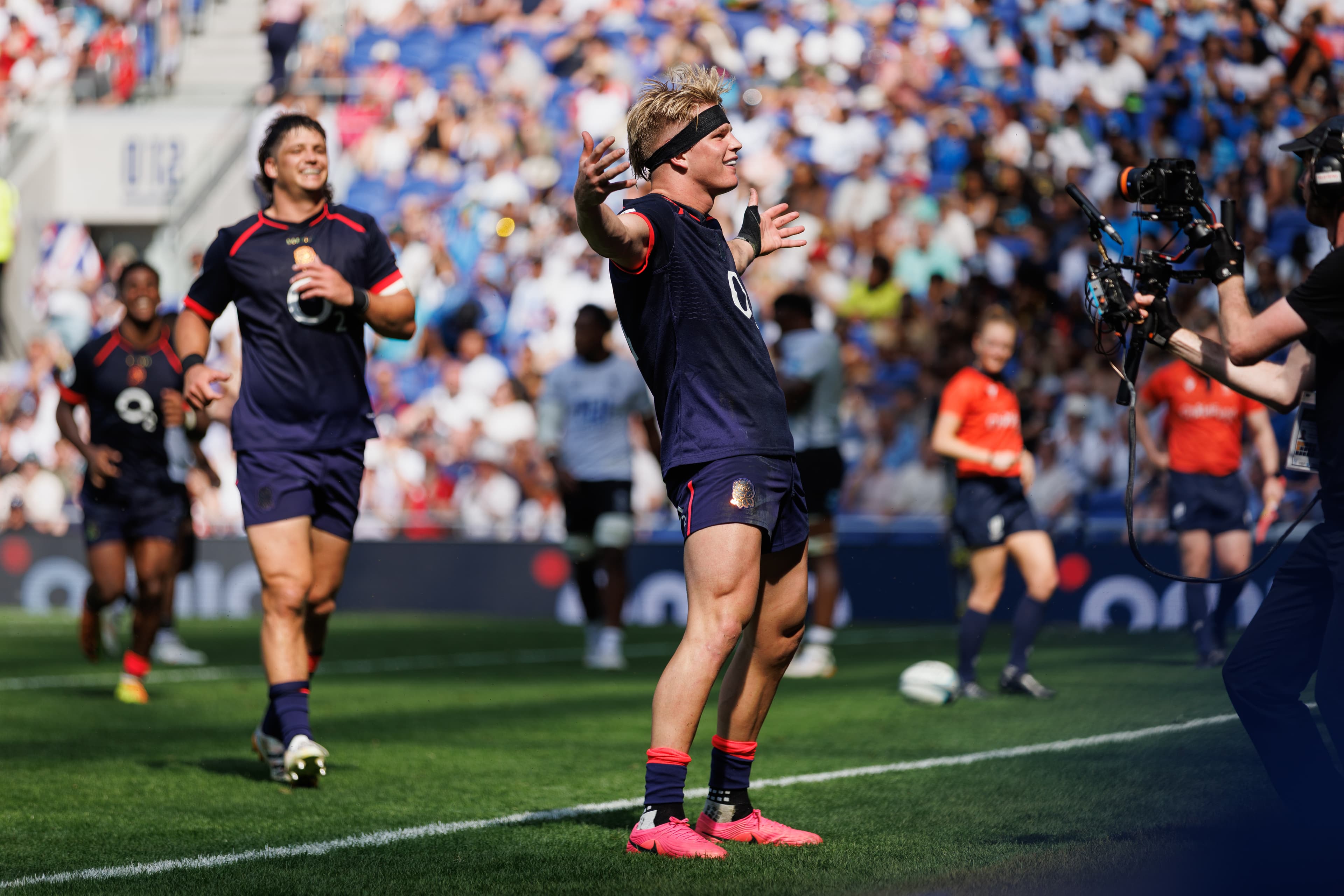 England rugby player kicking the ball during Fiji v England.