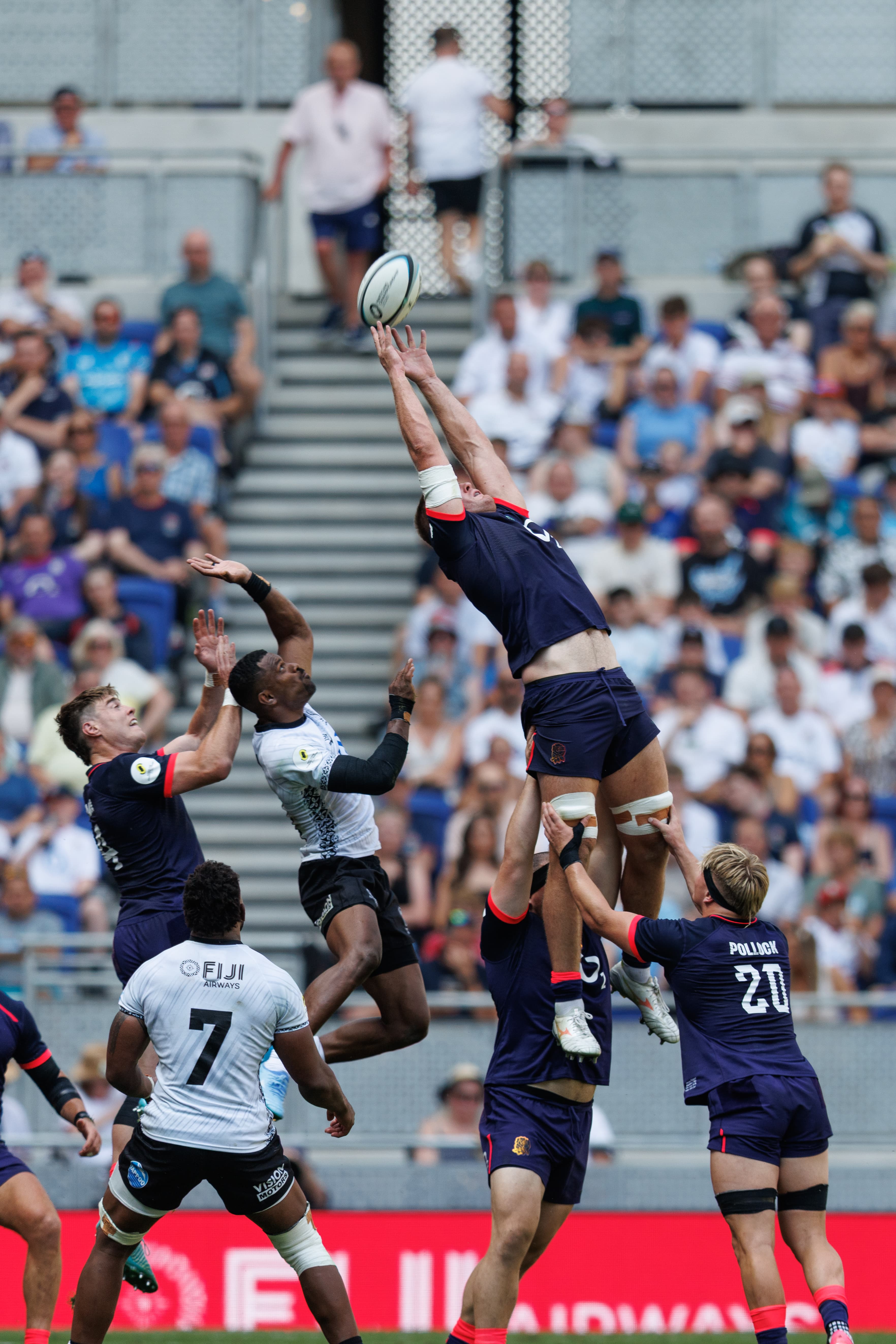 Rugby players competing in a lineout during Fiji v England.