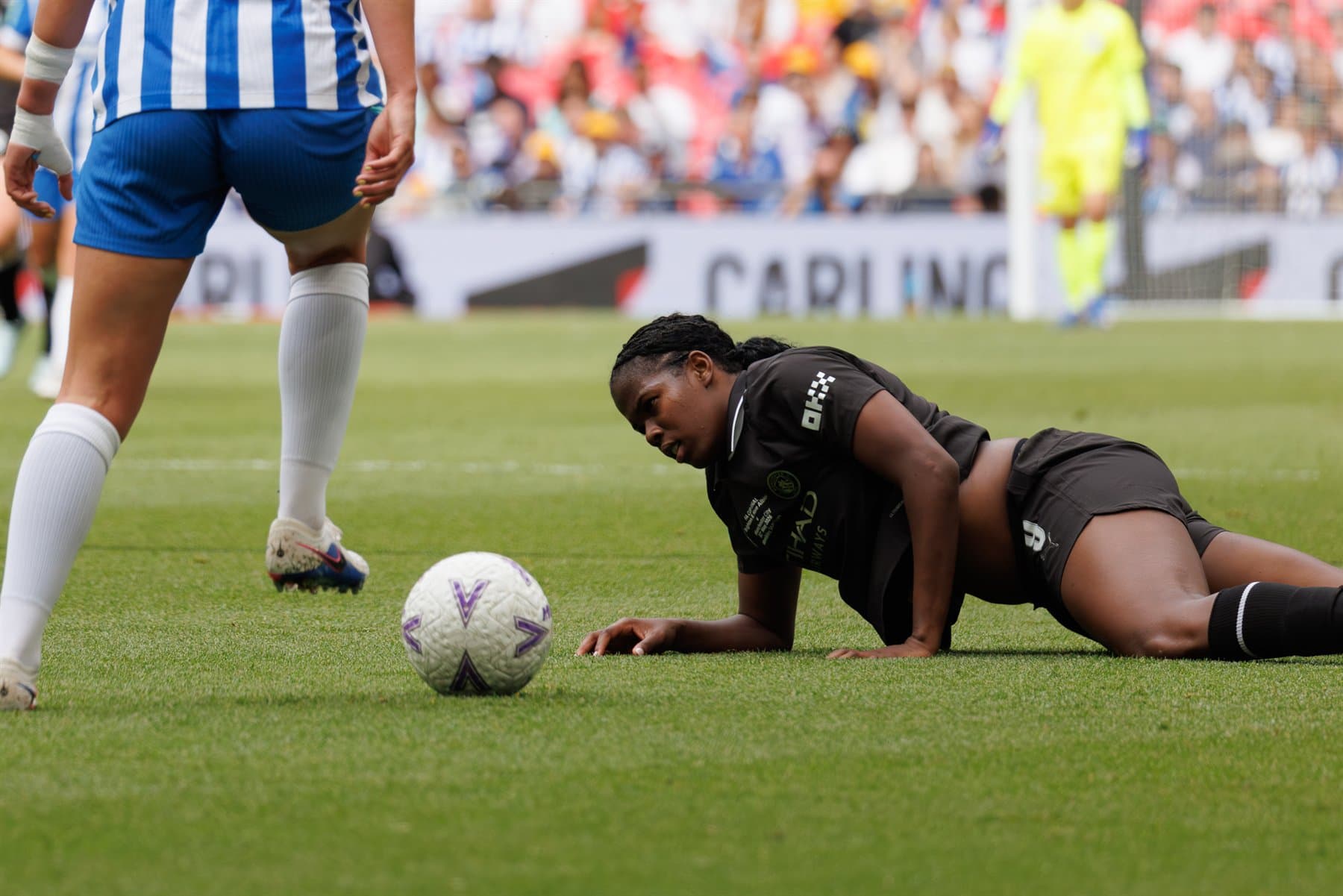 Khadija Bunny Shaw on the pitch after a challenge during the Women's FA Cup Final at Wembley.